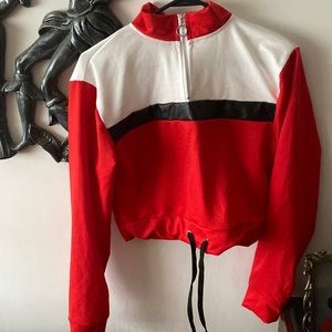 Red, white, and black long sleeve top with zipper